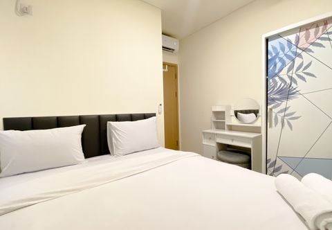 Bedroom Restful and Modern Look 2BR Apartment at Meikarta By Travelio