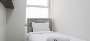 Bedroom 2 Comfort and Cozy Stay 2BR Apartment at 29th Floor Transpark Cibubur By Travelio