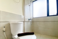 In-room Bathroom Comfort Stay and Cozy 2BR Apartment at Meikarta By Travelio