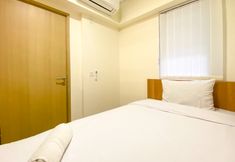 Bedroom 2 Comfort Stay and Cozy 2BR Apartment at Meikarta By Travelio