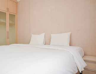 Bedroom 2 Homey and Compact 2BR Apartment Marina Ancol By Travelio