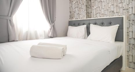 Bedroom 2 Good Choice 2BR Apartment Bassura City near Mall By Travelio