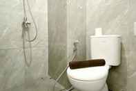 In-room Bathroom Cozy Designed and Comfort Studio Sayana Bekasi Apartment By Travelio