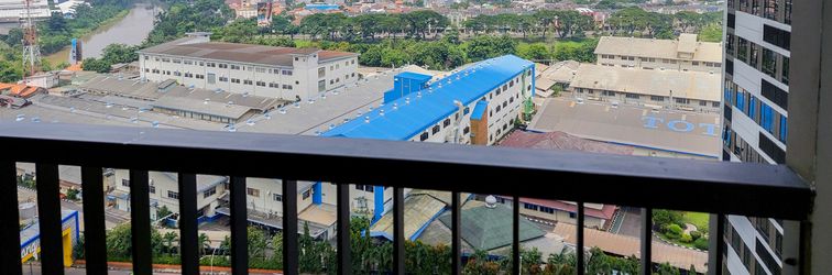 Lobby Cozy Stay and Restful Studio with Balcon at Collins Boulevard Apartment By Travelio