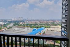 Lobby Cozy Stay and Restful Studio with Balcon at Collins Boulevard Apartment By Travelio