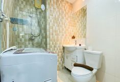 In-room Bathroom 3 Good Choice and Cozy Studio Apartment at Ambassade Kuningan By Travelio