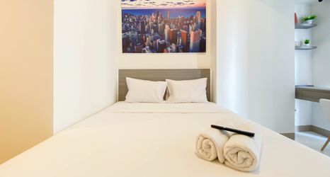 Bedroom 2 Homey and Good Studio Tokyo Riverside PIK 2 Apartment By Travelio