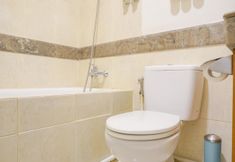 In-room Bathroom 4 Comfort and Simply Look 1BR Apartment at Bellezza By Travelio