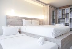 Bedroom 3 Minimalist and Comfort Studio at Amethyst Apartment By Travelio