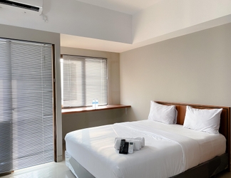 Bedroom 2 Minimalist and Homey Studio Gateway Park LRT City Bekasi Apartment By Travelio