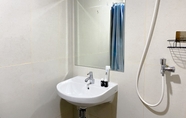 In-room Bathroom 4 Minimalist and Homey Studio Gateway Park LRT City Bekasi Apartment By Travelio