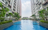 Swimming Pool 6 Minimalist and Homey Studio Gateway Park LRT City Bekasi Apartment By Travelio