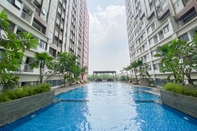 Swimming Pool Minimalist and Homey Studio Gateway Park LRT City Bekasi Apartment By Travelio