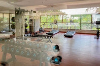 Fitness Center Minimalist and Homey Studio Gateway Park LRT City Bekasi Apartment By Travelio