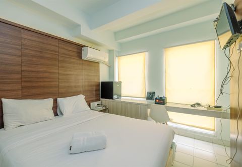 Bilik Tidur Nice and Cozy Studio at Patraland Urbano Apartment By Travelio