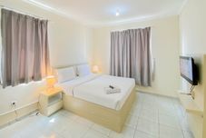 Bilik Tidur Relaxing Studio Apartment Grand Palace Kemayoran By Travelio