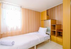 Bedroom 2 Tidy and Comfortable Studio at Dave Apartment By Travelio