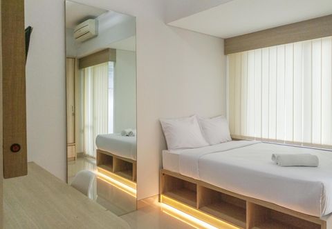 Bedroom Cozy Designed Studio Apartment at Taman Melati Sinduadi By Travelio