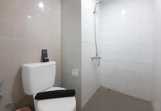 In-room Bathroom 3 Cozy Designed Studio Apartment at Taman Melati Sinduadi By Travelio