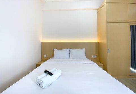 Bedroom Comfort and Simply Design Studio Apartment at Vasanta Innopark By Travelio