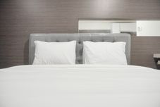 Bilik Tidur Cozy Living Studio Apartment at Green Bay Pluit By Travelio