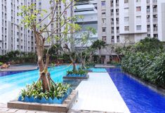 Kolam Renang 5 Cozy Living Studio Apartment at Green Bay Pluit By Travelio
