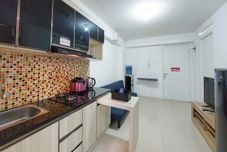 Lobby Comfortable and Warm 2BR Apartment at Bassura City By Travelio