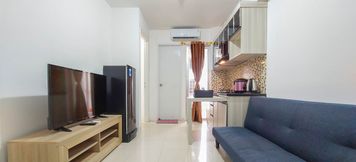 Others 3 Comfortable and Warm 2BR Apartment at Bassura City By Travelio