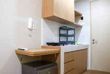 Common Space Cozy Stay Studio Room Apartment at Tokyo Riverside PIK 2 By Travelio