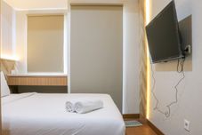 Bedroom Cozy Stay Studio Room Apartment at Tokyo Riverside PIK 2 By Travelio