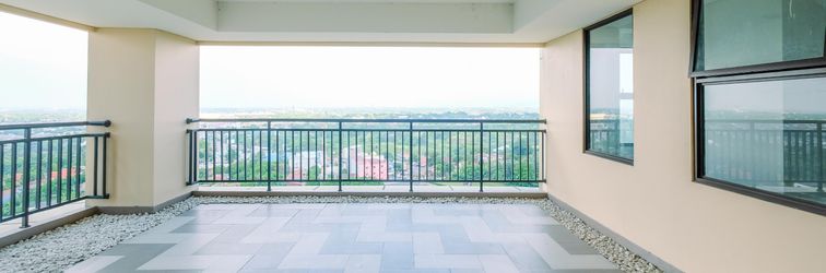 Lobby Cozy 2BR Apartment Transpark Cibubur near Mall By Travelio