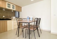 Common Space 4 Modern and Spacious 3BR at Meikarta Apartment By Travelio