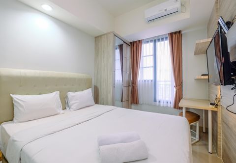 臥室 Comfortable and Modern Look Studio Evenciio Margonda Apartment By Travelio