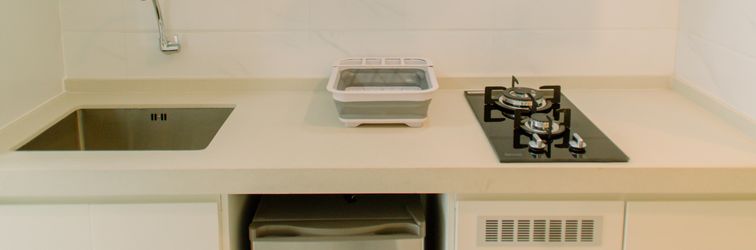 Lobby Minimalist and Homey Studio Apartment at Sky House BSD By Travelio