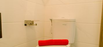 In-room Bathroom 5 Minimalist and Homey Studio Apartment at Sky House BSD By Travelio