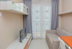 Common Space 2 Comfortable 1BR Apartment at Signature Park Grande near Cawang Station By Travelio