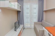 Common Space Comfortable 1BR Apartment at Signature Park Grande near Cawang Station By Travelio