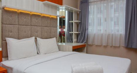Bedroom 2 Comfortable 1BR Apartment at Signature Park Grande near Cawang Station By Travelio