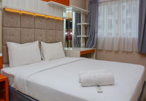 Bedroom Comfortable 1BR Apartment at Signature Park Grande near Cawang Station By Travelio