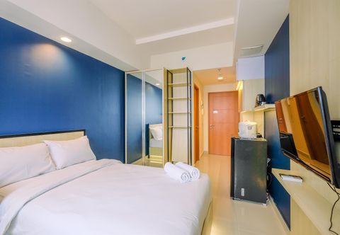 臥室 Elegant Studio Apartment at Evenciio Margonda By Travelio