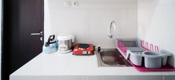 Common Space 2 Best Choice and Comfy Studio at Suncity Residence Apartment By Travelio