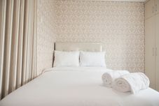 침실 Modern and Homey Studio at Sky Terrace Apartment By Travelio