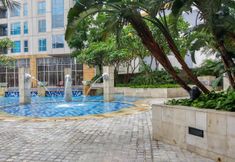 Lobby 4 Comfy and Elegant 2BR Apartment at Casa Grande Residence By Travelio