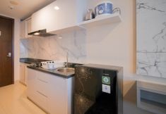 Others 3 Comfortable Living and Compact Studio at Grand Sungkono Lagoon Apartment By Travelio