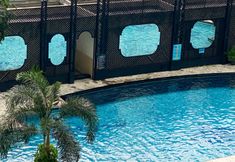 Swimming Pool 5 Good Place 2BR Bellagio Residence Apartment By Travelio