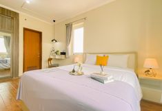 Phòng ngủ 2 Restful and Nice Studio at Grand Palace Kemayoran Apartment near JIEXPO By Travelio