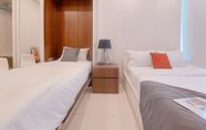 Bedroom 2 Homey and Warm 1BR at Brooklyn Alam Sutera Apartment By Travelio