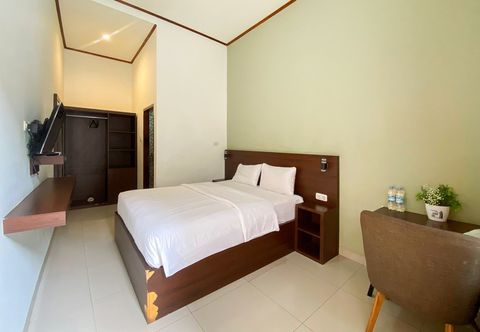 Bedroom Hotel Dioba Gite Syariah Mitra RedDoorz