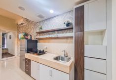 Common Space 4 Homey and Good Place 1BR at Uttara The Icon Apartment By Travelio