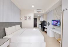 臥室 2 Cozy and Good Studio at Patraland Amarta Apartment By Travelio